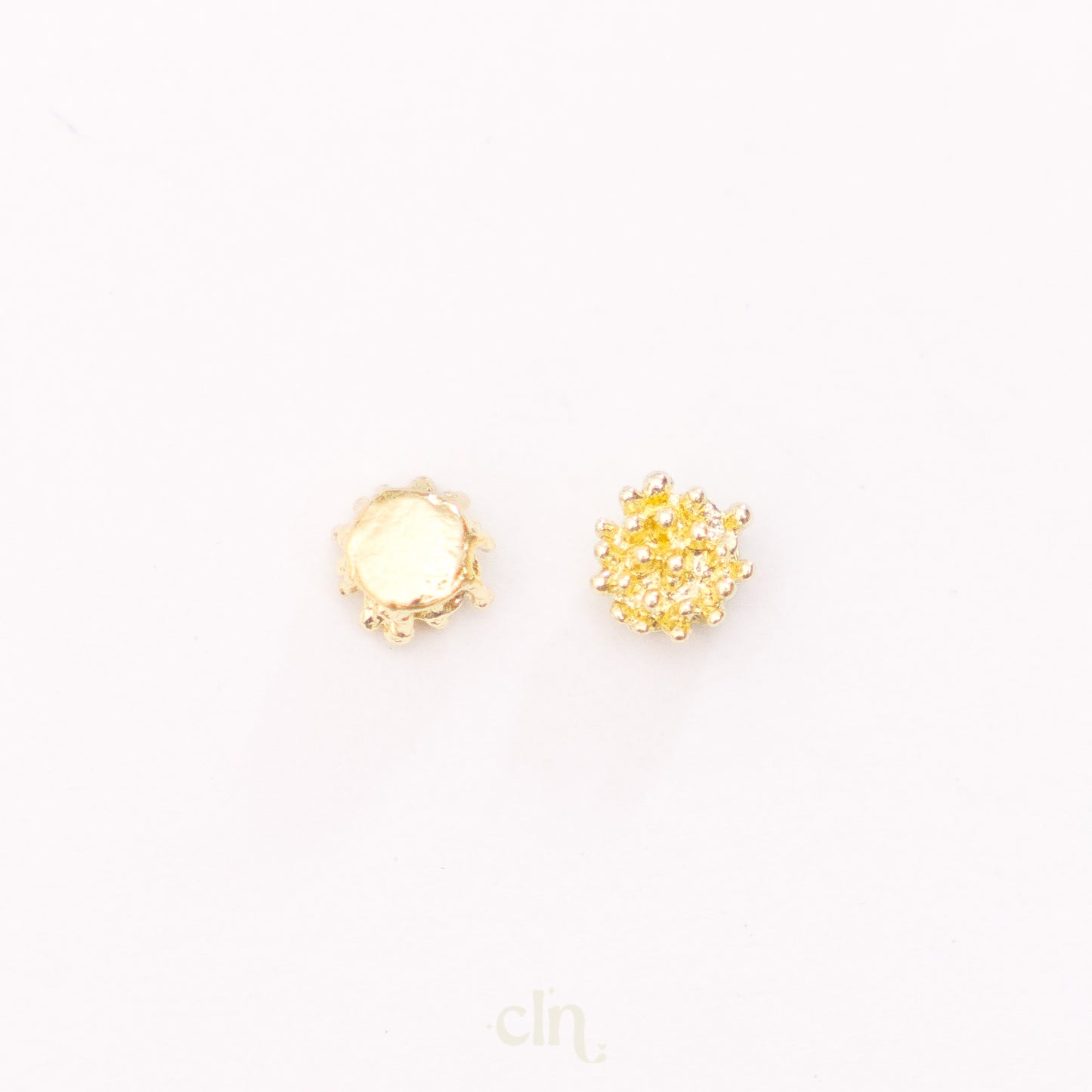 a pair of yellow diamond stud earrings