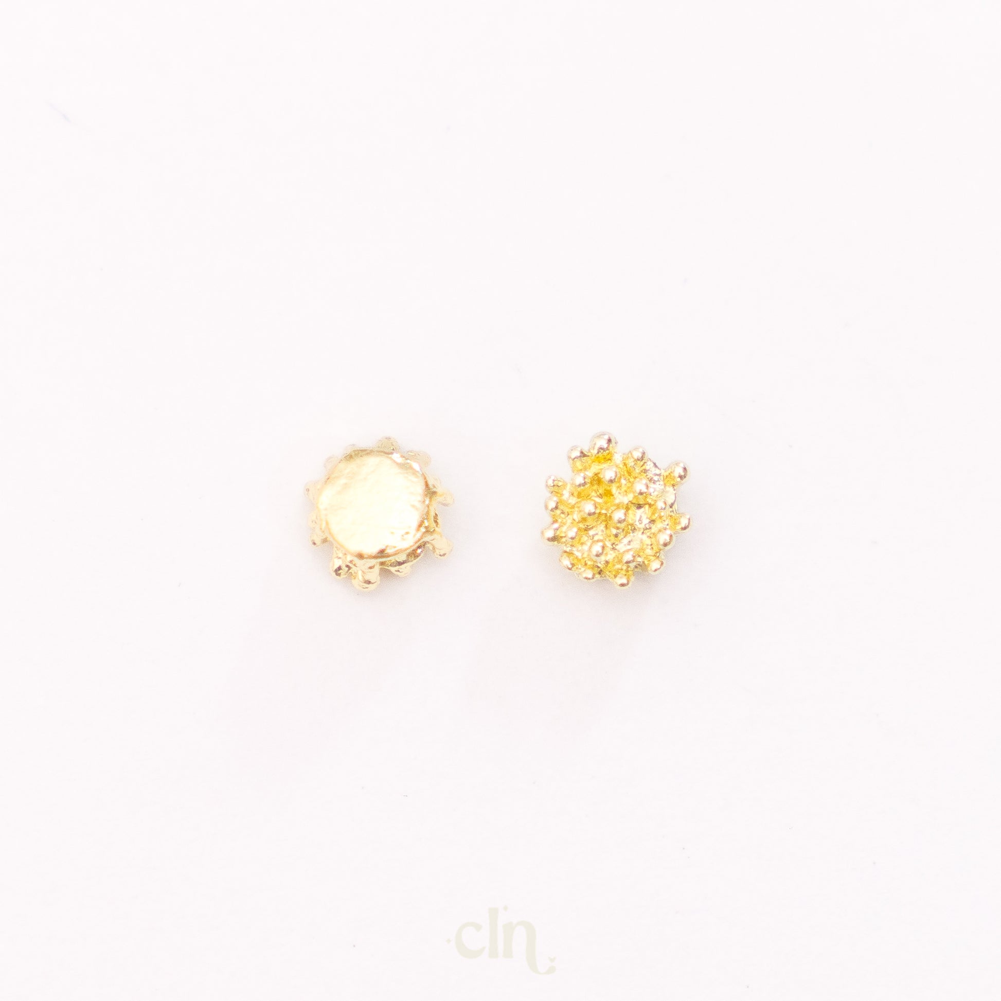 a pair of yellow diamond stud earrings